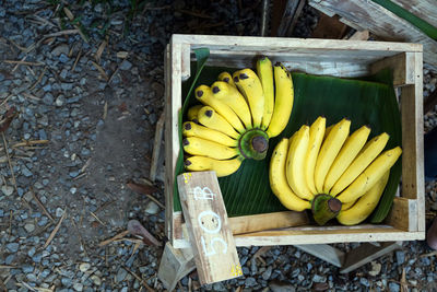 High angle view of bananas in crate