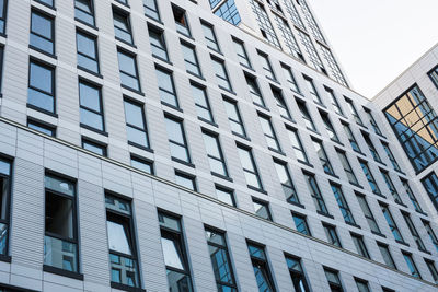 Low angle view of modern building against clear sky