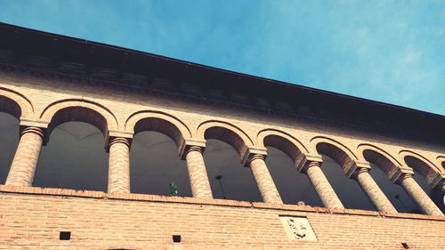 Low angle view of building against blue sky