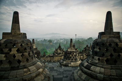 Borobudur temple against sky during sunrise