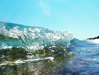 Scenic view of snowcapped mountain against cloudy sky