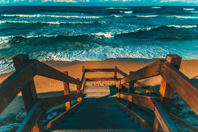 Pier over sea against sky