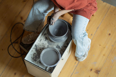 Low section of man working in workshop