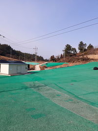 Scenic view of field against clear sky