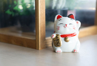 Close-up of figurine toy on table