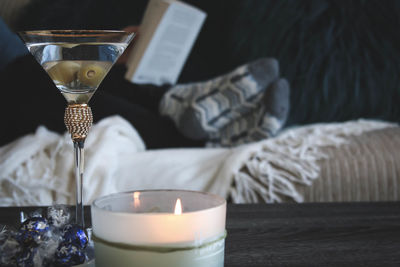 Close-up of tea light candles on table