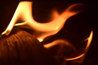 Close-up of burning candle