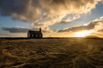 View of the budakirkja, the famous black church in budir in the snaefelsness peninsula, iceland