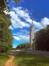 View of tower against cloudy sky