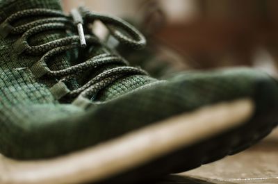 Close-up of shoe on floor