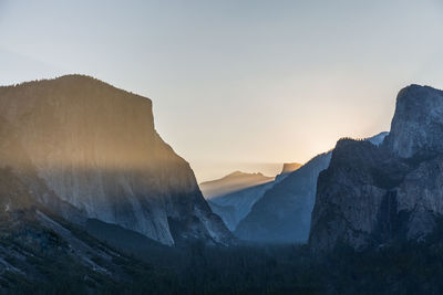 Scenic view of mountains against sky during sunset