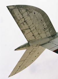 Low angle view of airplane flying against sky