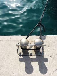 High angle view of metal container against sea