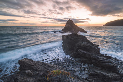 Scenic view of sea against sky during sunset