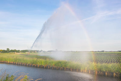 Rainbow by irrigation watering installation