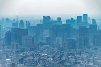 Modern buildings in city against sky