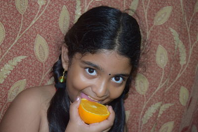 Close-up portrait of a girl at home