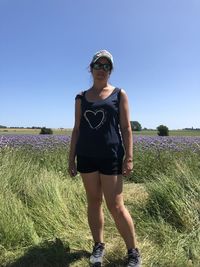 Full length of teenage girl standing on field