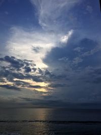 Scenic view of sea against sky at sunset