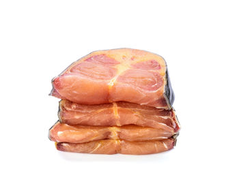 Close-up of bread against white background