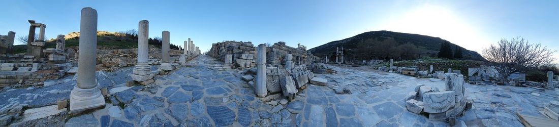 Panoramic view of castle on mountain against sky