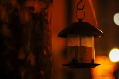 Close-up of illuminated lantern hanging at night