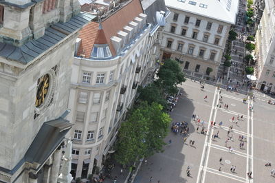 High angle view of street amidst buildings in town