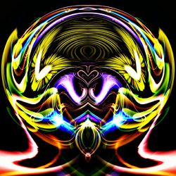 Close-up of light painting against black background