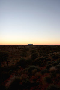 Scenic view of landscape at sunset