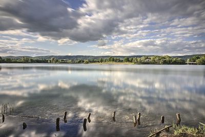 View of lake against cloudy sky