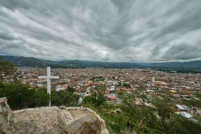 Aerial view of townscape against sky