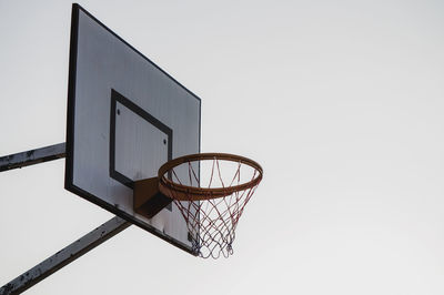 Low angle view of basketball hoop against sky