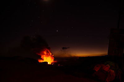 Bonfire against sky at night