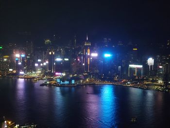 Illuminated buildings in city at night