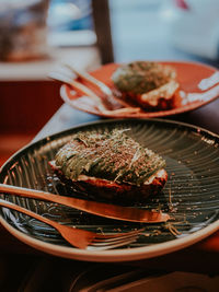 Close-up of food in avocado toast plate on table