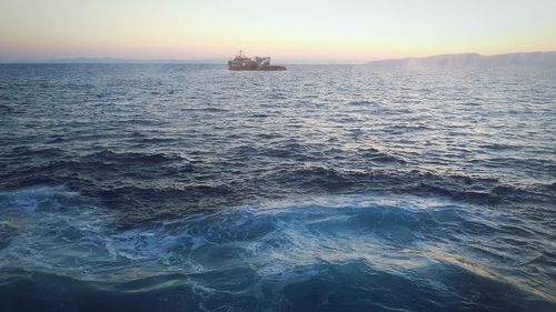 Scenic view of sea at sunset