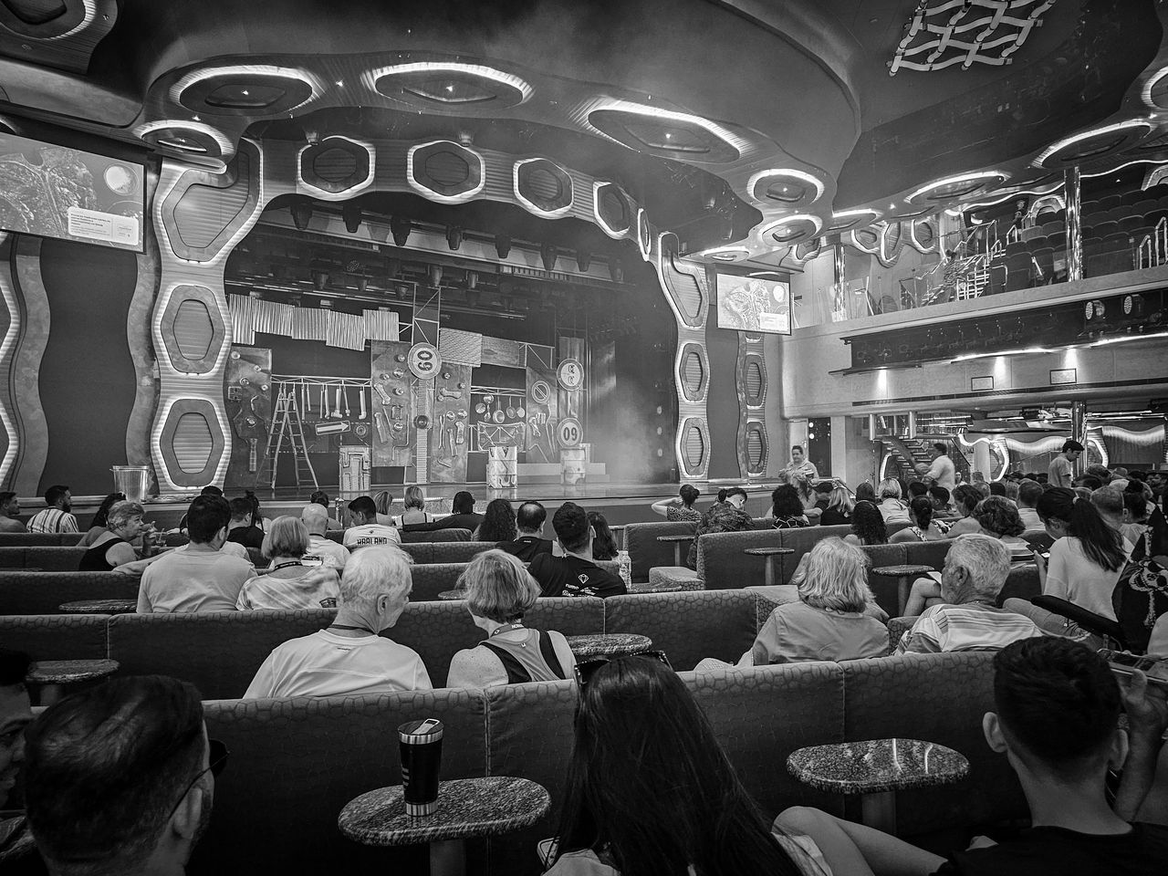 black and white, monochrome, crowd, monochrome photography, group of people, indoors, adult, architecture, black, women, large group of people, food and drink, men, lifestyles, sitting, business, restaurant, seat, arts culture and entertainment
