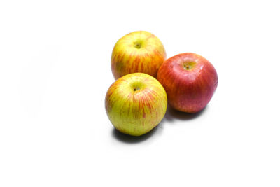 Close-up of apple against white background