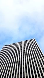 Low angle view of skyscraper against sky