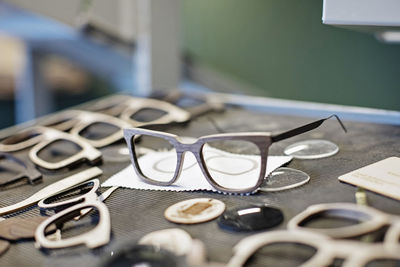 Eyeglasses frames on table at workshop