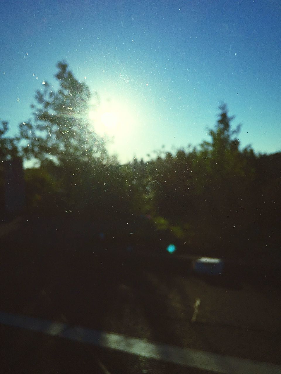 nature, sky, tree, drop, no people, window, sun, road, beauty in nature, defocused, day, outdoors