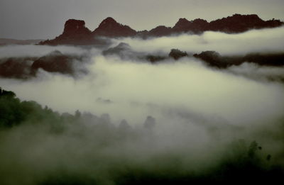 Scenic view of fog against sky