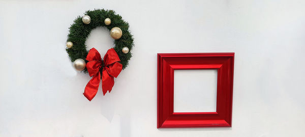 Close-up of christmas decoration on wall