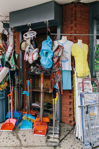 Multi colored clothes hanging on store