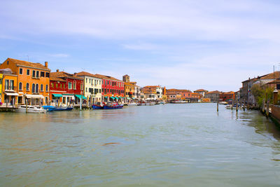 View of canal along buildings