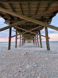 Pier over sea against sky