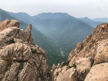 Scenic view of rocky mountains against sky