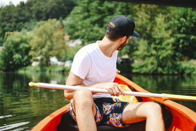 Man sitting in a lake