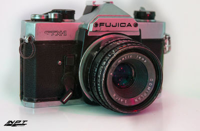 Close-up of camera on table