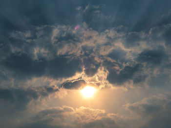 Low angle view of cloudy sky at sunset